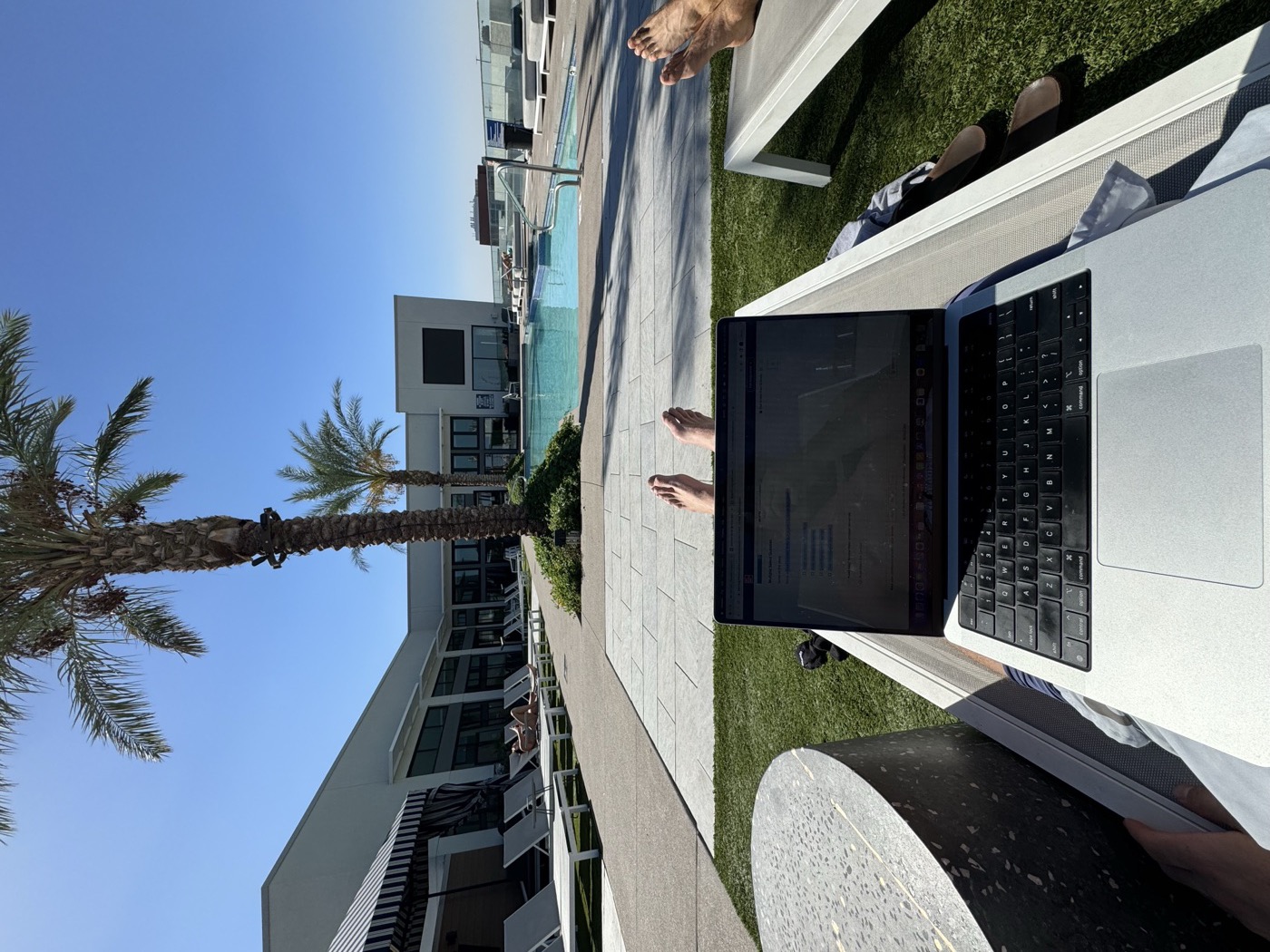 Working poolside on a financial model